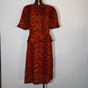 peplum, crew-neck, rust crepe printed dress, vintage from late 1970s-early 1980s